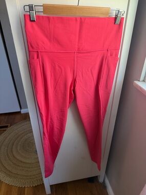 Athleta Salutation Stash High Rise Active Leggings with Side Pocket in Punch
